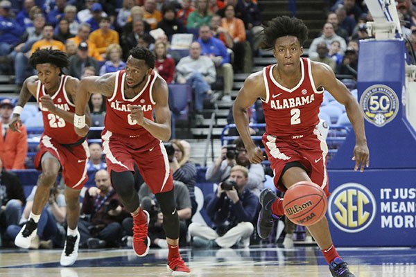 Alabama guard Collin Sexton leads a fast break in the second half of an NCAA college basketball quarterfinal game against Auburn at the Southeastern Conference tournament Friday, March 9, 2018, in St. Louis. (Chris Lee/St. Louis Post-Dispatch via AP)

