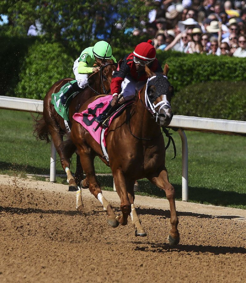 Whitmore (front), with Ricardo Santana Jr. aboard, is running in today’s Hot Springs Stakes at Oaklawn Park.