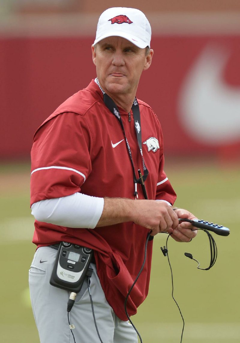 NWA Democrat-Gazette/ANDY SHUPE
Arkansas coach Chad Morris watches his players Saturday, March 10, 2018, during practice at the university practice field in Fayetteville. Visit nwadg.com/photos to see more photos from practice.