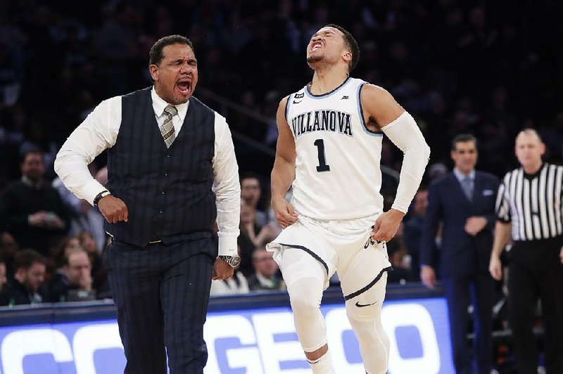 Providence Coach Ed Cooley had to lead the second half and overtime of the Friars’ 76-66 loss to Villanova
in the Big East Championship game Saturday with a towel tucked into his waist and draped over his backside after ripping his pants.