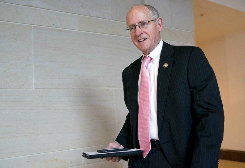 In this March 8, 2018, photo, Rep. Mike Conaway, R-Texas, left, at the Capitol in Washington. 