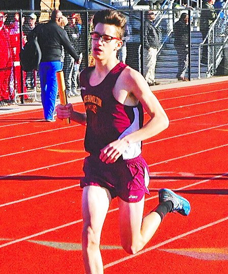 Submitted photo GOLDEN RELAY: Skylar Davis, pictured, ran with Lake Hamilton teammates Dylan Stephens, Colby Swecker and Cody Weldon Thursday in Benton to a first-place time of 8:17.24 in the boys' 4x800-meter relay. The Wolves won the 13-school meet with 108 points.