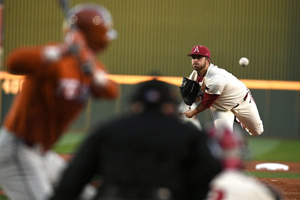 Arkansas pitcher Kacey Murphy throws a pitch during a game against Texas on Tuesday, March 13, 2018, in Fayetteville. 