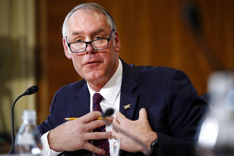 Interior Secretary Ryan Zinke testifies before the Senate Committee on Energy and Natural Resources during a committee hearing on the President's Budget Request for Fiscal Year 2019, Tuesday, March 13, 2018, on Capitol Hill in Washington. (AP Photo/Jacquelyn Martin)