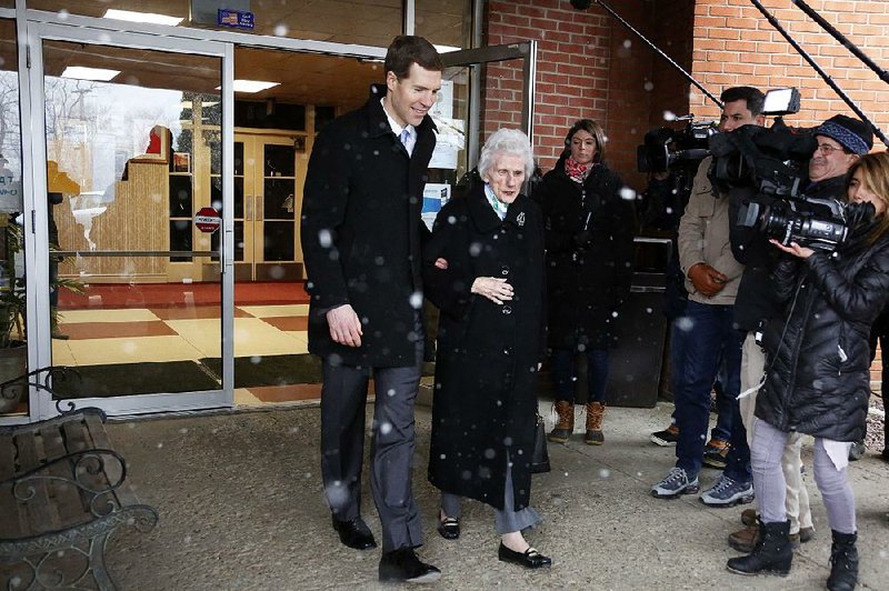 Conor Lamb, the Democratic candidate in Pennsylvania’s 18th Congressional District, leaves a polling place in Carnegie after taking his grandmother, Barbara Lamb, to vote in Tuesday’s election.