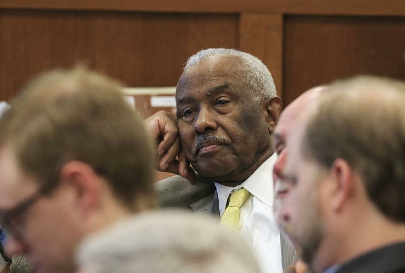 Rep. John Walker, D-Little Rock, waits for an answer to a question Tuesday during discussion on the bill to allow tax-free college savings funds to pay for private school tuition. The measure sailed through the House Education Committee on a voice vote.
