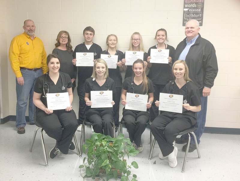 COURTESY PHOTO All students in Prairie Grove High School's first certified nursing assistant class passed the skills and written tests to be certified. The passing rate far exceeded the state passing rate. School Superintendent Allen Williams, instructor Mandy Allen and Assistant Superintendent David Kellogg stand with the students holding their CNA certificates: (back, left) Tyler Davidson, Nacona Walters, Nicole Henry, Sydney Ruland; (front, left) Hope Wilks, Sarah Cunningham, Megan Thompson, Emily Grant.