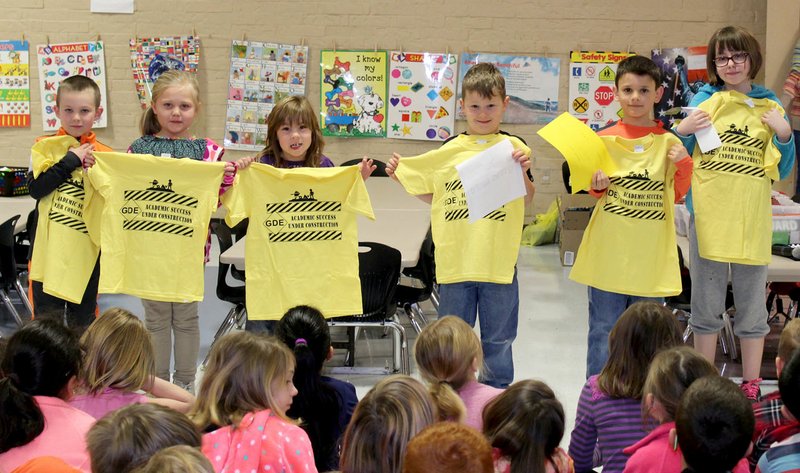 SUBMITTED "Pawsitive" and Wise Students of the Month at Glenn Duffy Elementary display the T-shirts and certificates they were awarded at the school's March Rise and Shine assembly. PAWS grade-level winners for March are Jace Bates (left), Paislee Weems, Rachel Heath, Jayden Alexander, Jack Frizzell and Myla Burnett.