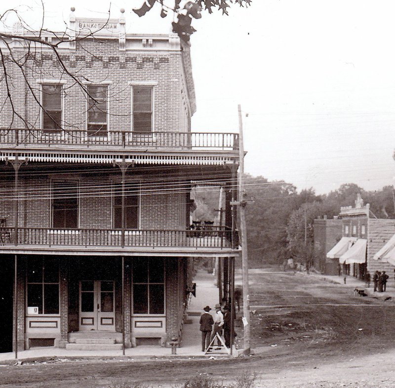 Photo courtesy of the Siloam Springs Museum An old picture of the intersection of Broadway and University Streets taken shortly after 1899 shows the Morris/Youree Hotel building on the left while the third floor and balconies were still intact. The Victorian Tea Party will be held in the Courtyard Event Center, which is in the basement of the historic building.