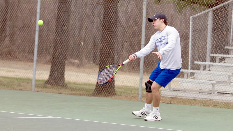 Photo courtesy of JBU Sports Information John Brown's Cade Cox improved to 4-1 in singles with a victory on Monday, helping JBU to a 5-4 team win against William Jewell at the JBU Tennis Courts.