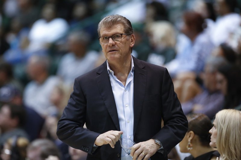 FILE - In this Feb. 21, 2018, file photo, Connecticut head coach Geno Auriemma watches the action in the second half of an NCAA basketball game against Tulane, in New Orleans. Auriemma says he has no interest in coaching the school's men's team. But the Hall-of-Famer, who has won 11 national championships, also says he could do it and would enjoy doing it. (AP Photo/Scott Threlkeld, File)