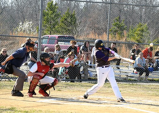 The Sentinel-Record/Grace Brown POWER SURGE: Fountain Lake's Montana Carden hits a single during a baseball game Tuesday at Cutter Morning Star's baseball field. Carden had three singles and three RBIs in Fountain Lake's 14-2 win.