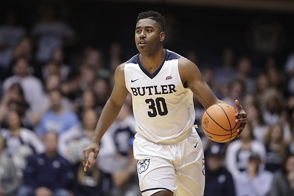 Butler forward Kelan Martin (30) brings the ball up court against Creighton in the first half of an NCAA college basketball game in Indianapolis, Tuesday, Feb. 20, 2018. (AP Photo/Michael Conroy)

