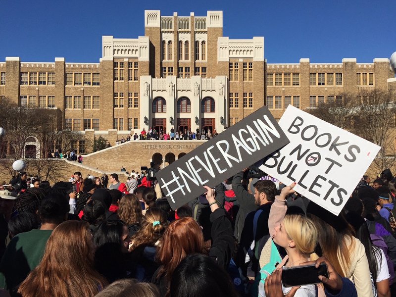 Students at Little Rock's Central High School participate in a walkout Wednesday, March 14, 2018, in solitary with victims of the Parkland, Fla., school shooting last month.