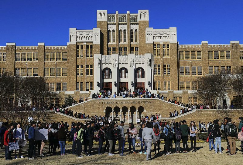 Students gather Wednesday morning in front of Little Rock Central High School for the national school walkout demonstration on the one-month anniversary of the shooting at Marjory Stoneman Douglas High School in Parkland, Fla., that left 17 dead. 