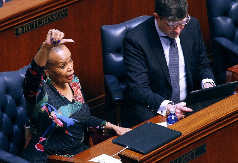 State Sen. Joyce Elliott gestures Wednesday that she would like to speak against Senate Bill 8, a measure to amend a state law concerning modification and review of permits issued by the Arkansas Department of Environmental Quality. 