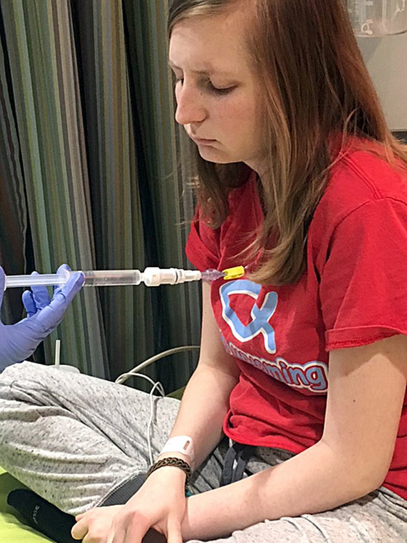 COURTESY PHOTO/Mandy receives IV chemotherapy through a port near her collarbone. St. Jude Children's Research Hospital paid for all of Mandy's treatments, travel and housing during her months of treatment.