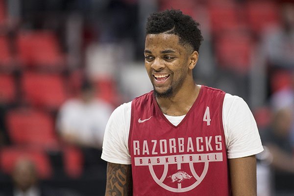 Arkansas guard Daryl Macon smiles during practice Thursday, March 15, 2018, at Little Caesars Arena in Detroit. 