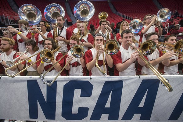 Arkansas band members play during a practice session Thursday, March 15, 2018, at Little Caesars Arena in Detroit. 