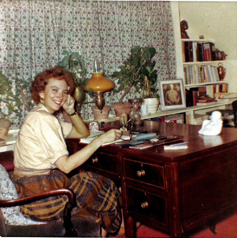 Madeleine L’Engle sits at her desk in this undated photograph.