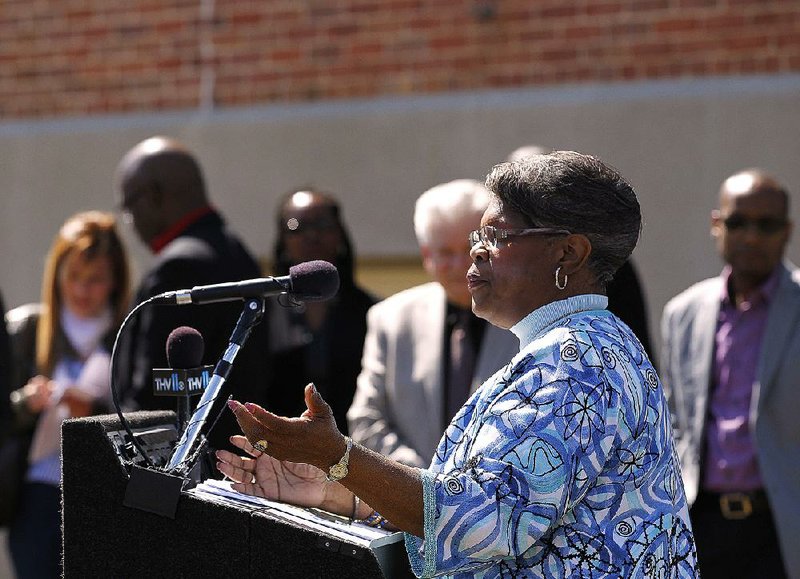 Pamela Bax speaks Thursday at the Willie Hinton Neighborhood Resource Center in Little Rock about the Jump Start 12th Street Committee’s branding campaign.
