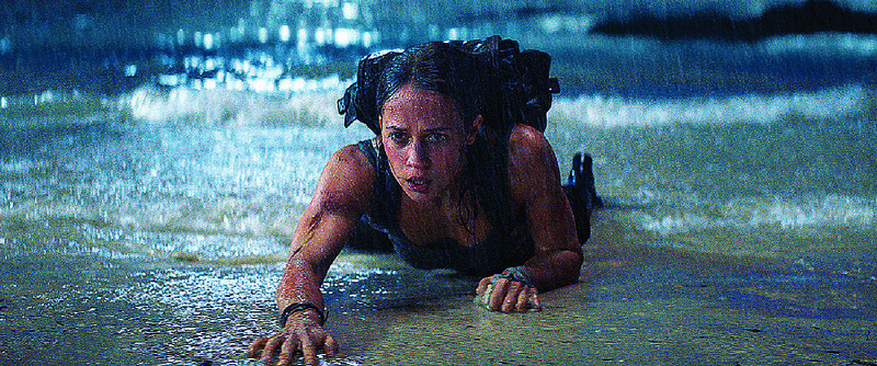 Lara Croft (Alicia Vikander) works on her fitness throughout the CGI-heavy video game action reboot of Tomb Raider.
