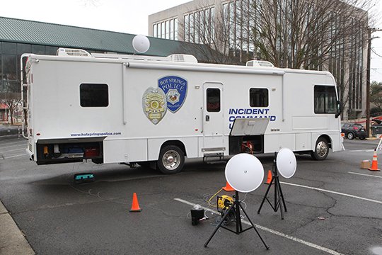 The Sentinel-Record/Richard Rasmussen INCIDENT COMMAND: The Hot Springs Police Department's mobile incident command center is parked Friday near the intersection of Broadway Street and Malvern Avenue in preparation for today's First Ever 15th Annual World's Shortest St. Patrick's Day Parade. While they have always had an incident command set up, this will be the first year the mobile vehicle will be used, Police Chief Jason Stachey said.