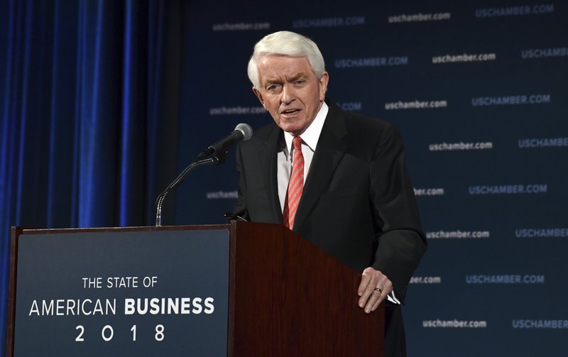 FILE- In this Jan. 10, 2018, file photo, U.S. Chamber of Commerce President and Chief Executive Officer Thomas Donohue delivers his annual "State of American Business" address at the Chamber of Commerce in Washington.  (AP Photo/Susan Walsh, File)