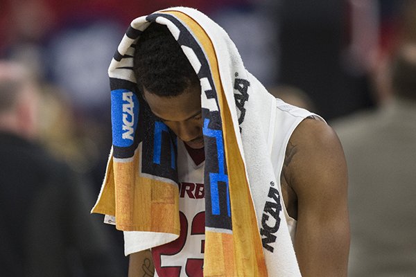 Arkansas guard C.J. Jones walks off the court following a loss to Butler in the NCAA Tournament on Friday, March 16, 2018, in Detroit. 