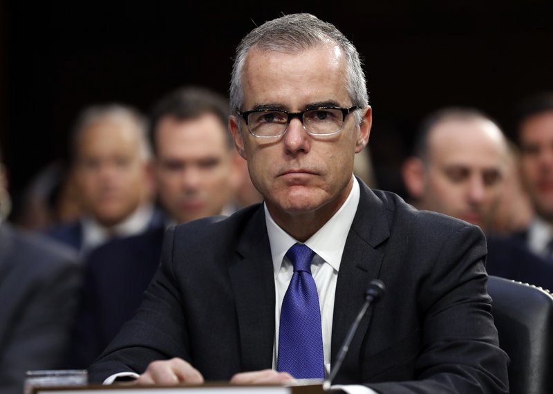 In this June 7, 2017 file photo, acting FBI Director Andrew McCabe appears before a Senate Intelligence Committee hearing about the Foreign Intelligence Surveillance Act on Capitol Hill in Washington. Attorney General Jeff Sessions said Friday, March 16, 2018, that he has fired former FBI Deputy Director McCabe, a longtime and frequent target of President Donald Trump's anger, just two days before his scheduled retirement date. (AP Photo/Alex Brandon, File)