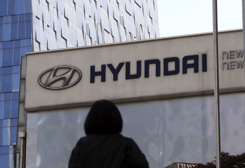 In this April 26, 2017, file photo, the logo of the Hyundai Motor Co. is displayed at the automaker's showroom in Seoul, South Korea. Air bags in some Hyundai and Kia cars failed to inflate in crashes and four people are dead. Now the U.S. government's road safety agency wants to know why. The National Highway Traffic Safety Administration says it's investigating problems that affect an estimated 425,000 cars made by the Korean automakers. The agency also is looking into whether the same problem could happen in vehicles made by other companies. (AP Photo/Lee Jin-man, File)