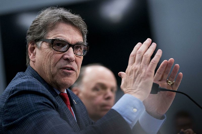 Energy Secretary Rick Perry, shown Thursday testifying at a House Appropriations subcommittee hearing, has created an office to help “combat the growing nefarious cyber threats we face.”
