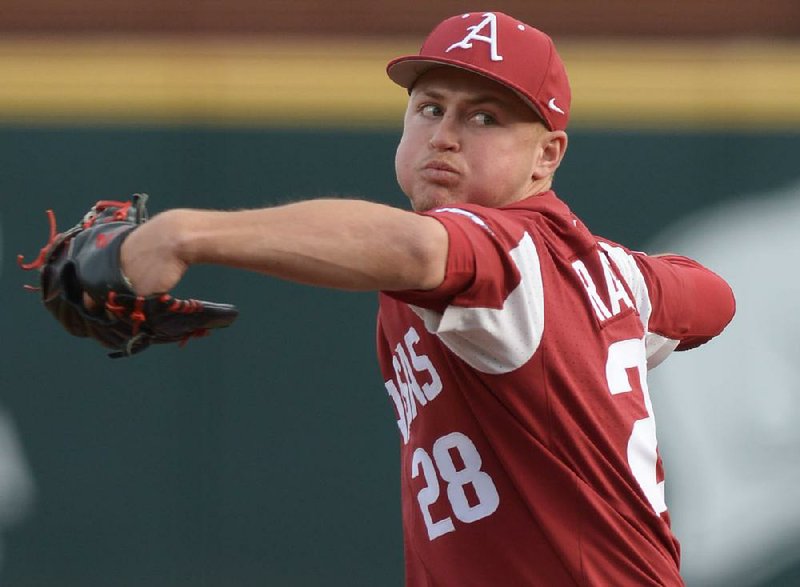 Arkansas starter Kole Ramage delivers Saturday during the first inning of the second game against Kentucky at Baum Stadium in Fayetteville. The Hogs won 16-9 to complete the sweep.
