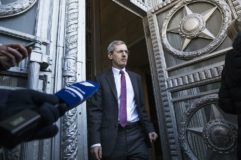 Laurie Bristow, British ambassador to Russia, leaves the Russian Foreign Ministry building Saturday after attending a meeting concerning the diplomatic dispute over a nerve-agent attack on a former spy in Britain.