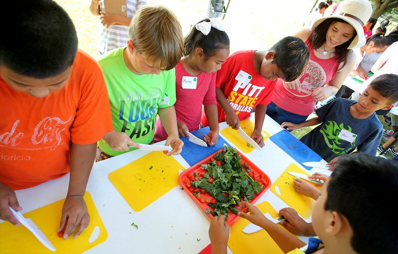 NWA Democrat-Gazette/DAVID GOTTSCHALK The nonprofit organization Apple Seeds will be working with the Mount Sequoyah Day Camp program March 20. Children will harvest vegetables from the Apple Seeds garden and learn to prepare them for a meal in the teaching kitchen.