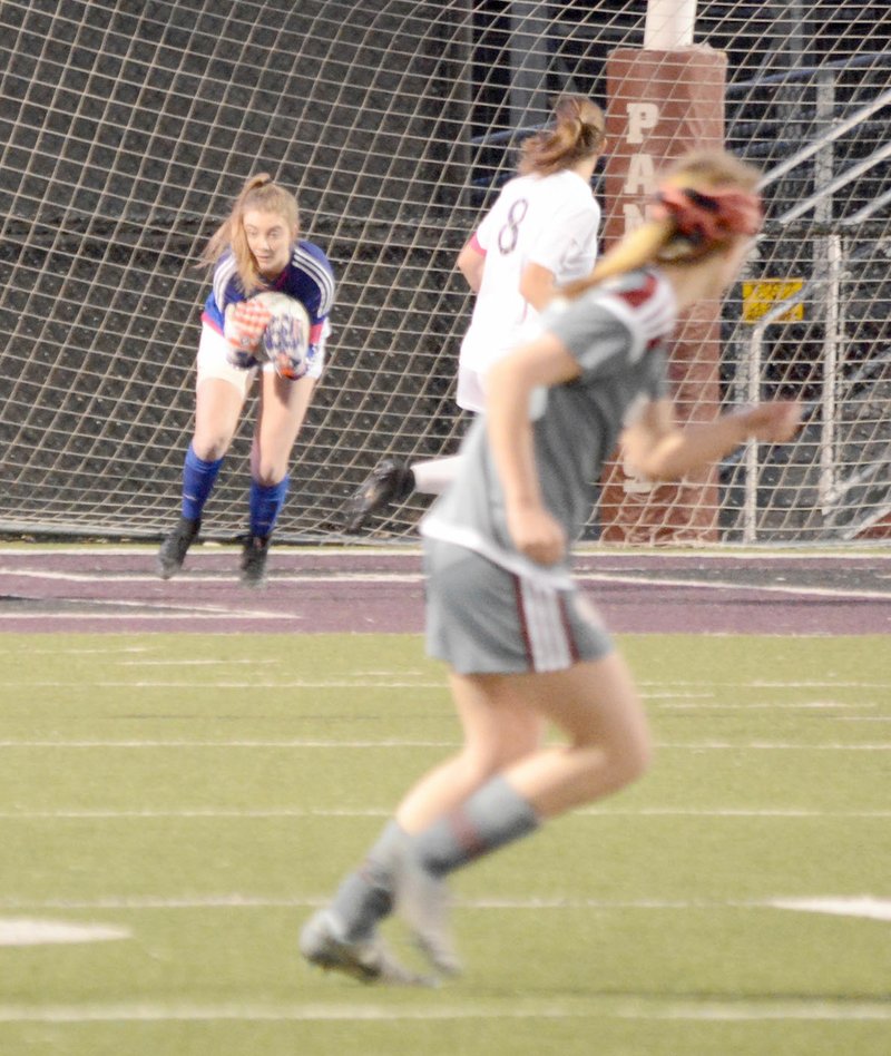 Graham Thomas/Siloam Sunday Siloam Springs senior goalkeeper Sydney Bomstad corrals an Owasso, Okla., shot on goal late in the second half Tuesday at Panther Stadium. The Lady Panthers and Lady Rams played to a 1-1 draw.