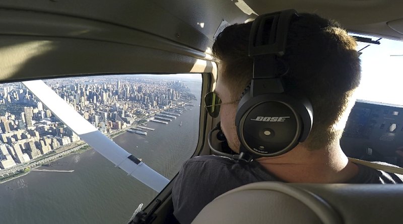 This Aug. 23, 2017, image made from a video Aaron Ludomirski, certified flight instructor for Infinity Flight Group, flies over the Hudson River in New York. Major U.S. airlines are hiring pilots at a rate not seen since before 9/11, and that is encouraging more young people to consider a career in the cockpit. (AP Photo/Joshua Replogle)