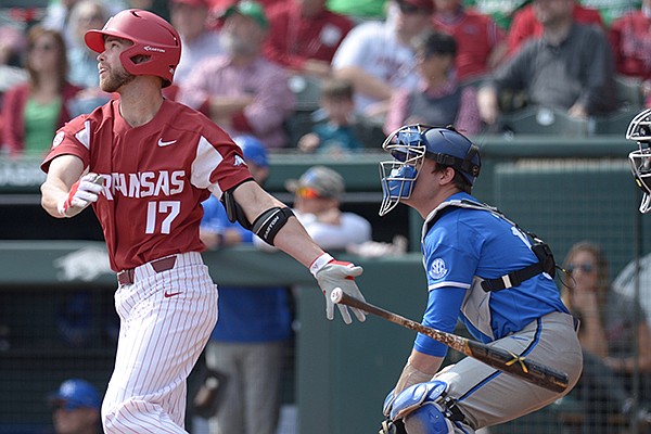 Arkansas' Luke Bonfield (17) hits a home run during a game against Kentucky on Saturday, March 17, 2018, in Fayetteville. 