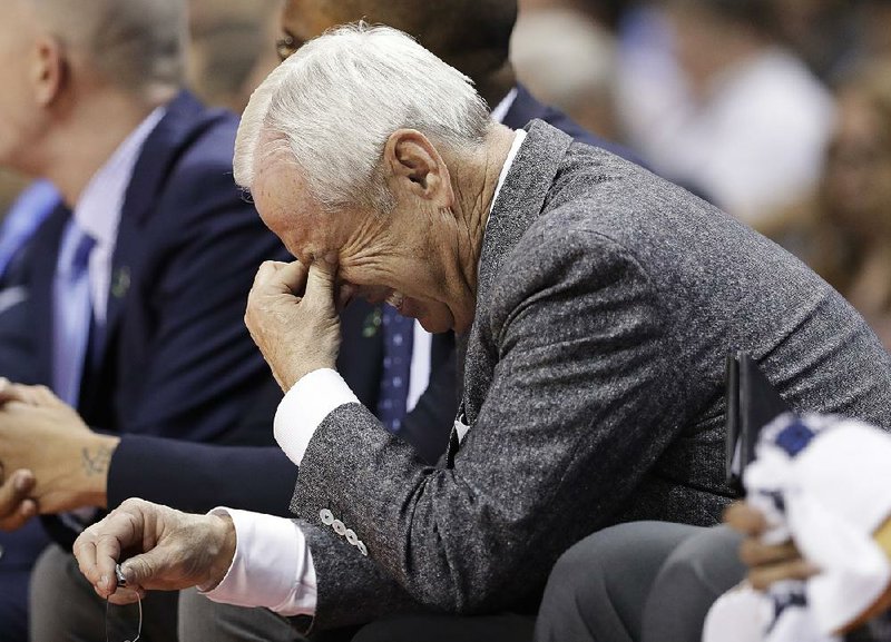 North Carolina Coach Roy Williams reacts on the bench during the second half Sunday against Texas A&M.