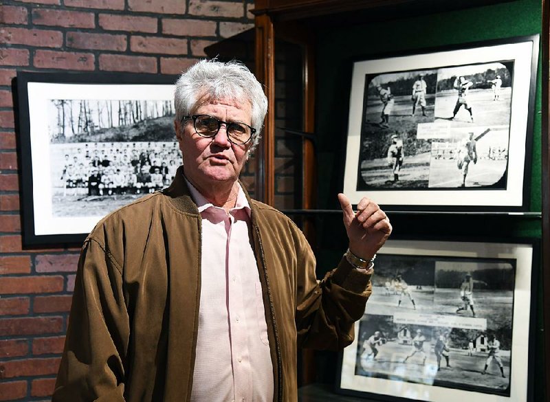 Robert Raines, owner of the Gangster Museum of America, gives  a tour Thursday of a new section of the museum featuring baseball memorabilia that has ties to Hot Springs.