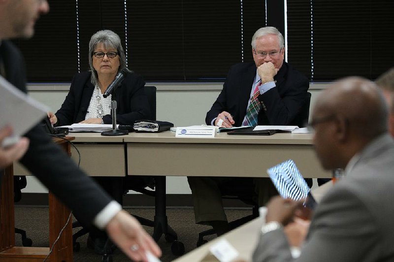 Cheryl May (left), chairman of the Arkansas School Safety Commission, and Vice Chairman Bill Temple preside over the first meeting of the governor-created group on Tuesday at the Criminal Justice Institute in Little Rock.