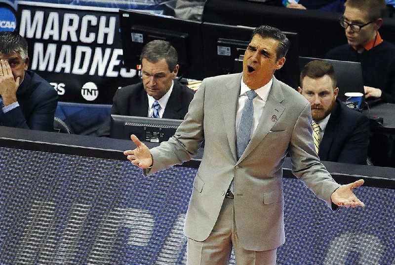 Villanova head coach Jay Wright questions a call during the first half of an NCAA men's college basketball tournament first-round game against Radford, in Pittsburgh, Thursday, March 15, 2018. 