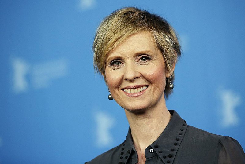 In this Sunday, Feb. 14, 2016, file photo, Actress Cynthia Nixon poses for the photographers during a photo call for the film 'A Quiet Passion' at the 2016 Berlinale Film Festival in Berlin, Germany. The former "Sex and the City" star says she'll challenge Gov. Andrew Cuomo in New York's Democratic primary in September. Her announcement Monday, March 19, 2018, sets up a race pitting an openly gay liberal activist against a two-term incumbent with a $30 million war chest and possible presidential ambitions. (AP Photo/Michael Sohn, File)