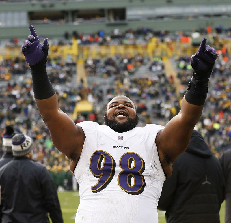 Baltimore Ravens' Brandon Williams celebrates during the second half of an NFL football game against the Green Bay Packers Sunday, Nov. 19, 2017, in Green Bay, Wis. The Ravens won 23-0. (AP Photo/Jeffrey Phelps)