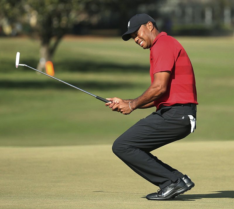 The Associated Press BAY HILL: Tiger Woods grimaces after missing a putt on the 15th green during the final round of the Arnold Palmer Invitational golf tournament Sunday in Orlando, Fla. Up next for Woods is the Masters at Augusta National.