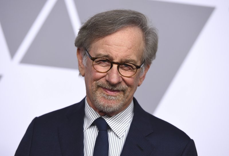 FILE - In this Feb. 5, 2018, file photo, Steven Spielberg arrives at the 90th Academy Awards Nominees Luncheon at The Beverly Hilton hotel in Beverly Hills, Calif. The 25th anniversary of Spielberg's "Schindler's List" and the 35th anniversary of Brian De Palma's "Scarface" will be celebrated with reunion screenings at the Tribeca Film Festival. The New York festival announced Monday, March 19, that Spielberg will join Liam Neeson, Ben Kingsley and Embeth Davidtz for a post-screening conversation April 26 at the Beacon Theatre. (Photo by Jordan Strauss/Invision/AP, File)