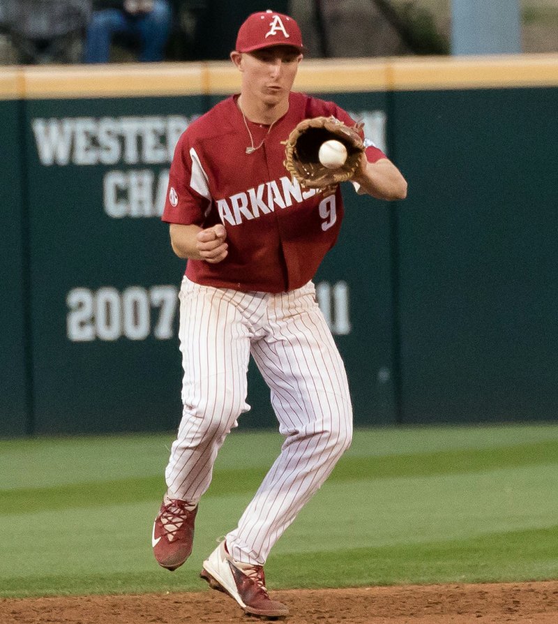 Special to The Sentinel-Record/Crant Osborne PLAYER OF THE WEEK: Arkansas junior shortstop Jax Biggers fields the ball Saturday during the Hogs' sweep of No. 4 Kentucky at Baum Stadium in Fayetteville. He batted 11-for-15 in a doubleheader Saturday as the Razorbacks closed out the SEC sweep at home.