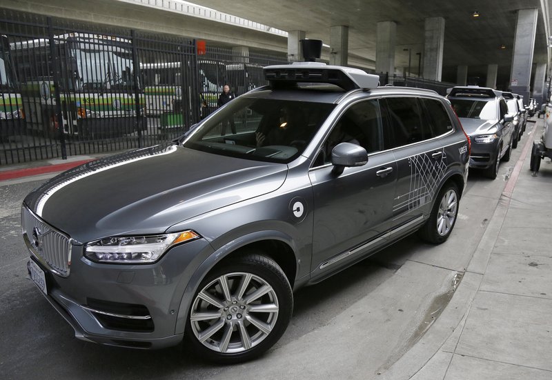 The Associated Press DRIVERLESS CAR: In this Dec. 13, 2016, file photo, an Uber driverless car heads out for a test drive in San Francisco. Police in a Phoenix suburb say one of Uber's self-driving vehicles has struck and killed a pedestrian. Police in the city of Tempe said Monday, that the vehicle was in autonomous mode with an operator behind the wheel when the woman walking outside of a crosswalk was hit.