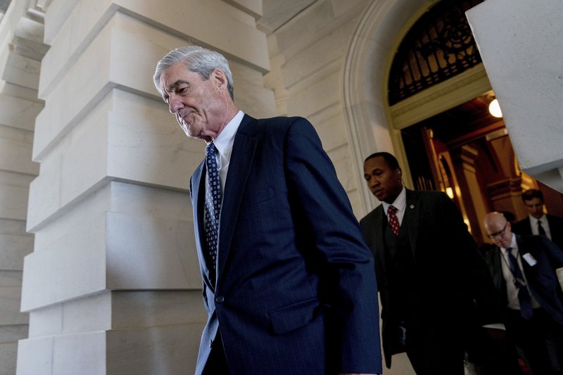 The Associated Press FORMER DIRECTOR: In this June 21, 2017, file photo, former FBI Director Robert Mueller, the special counsel probing Russian interference in the 2016 election, departs Capitol Hill following a closed door meeting in Washington. President Donald Trump is questioning the impartiality of Mueller's investigation and says the probe is groundless, while raising doubts about whether a fired top FBI official kept personal memos outlining his interactions with Trump.