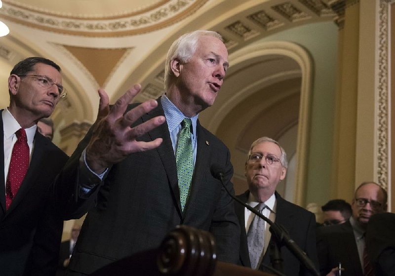 Sen. John Cornyn (center), R-Texas, said Tuesday that lawmakers had communicated to President Donald Trump “informally and formally” that there would be “a number of unintended consequences” if special counsel Robert Mueller were to be removed. 